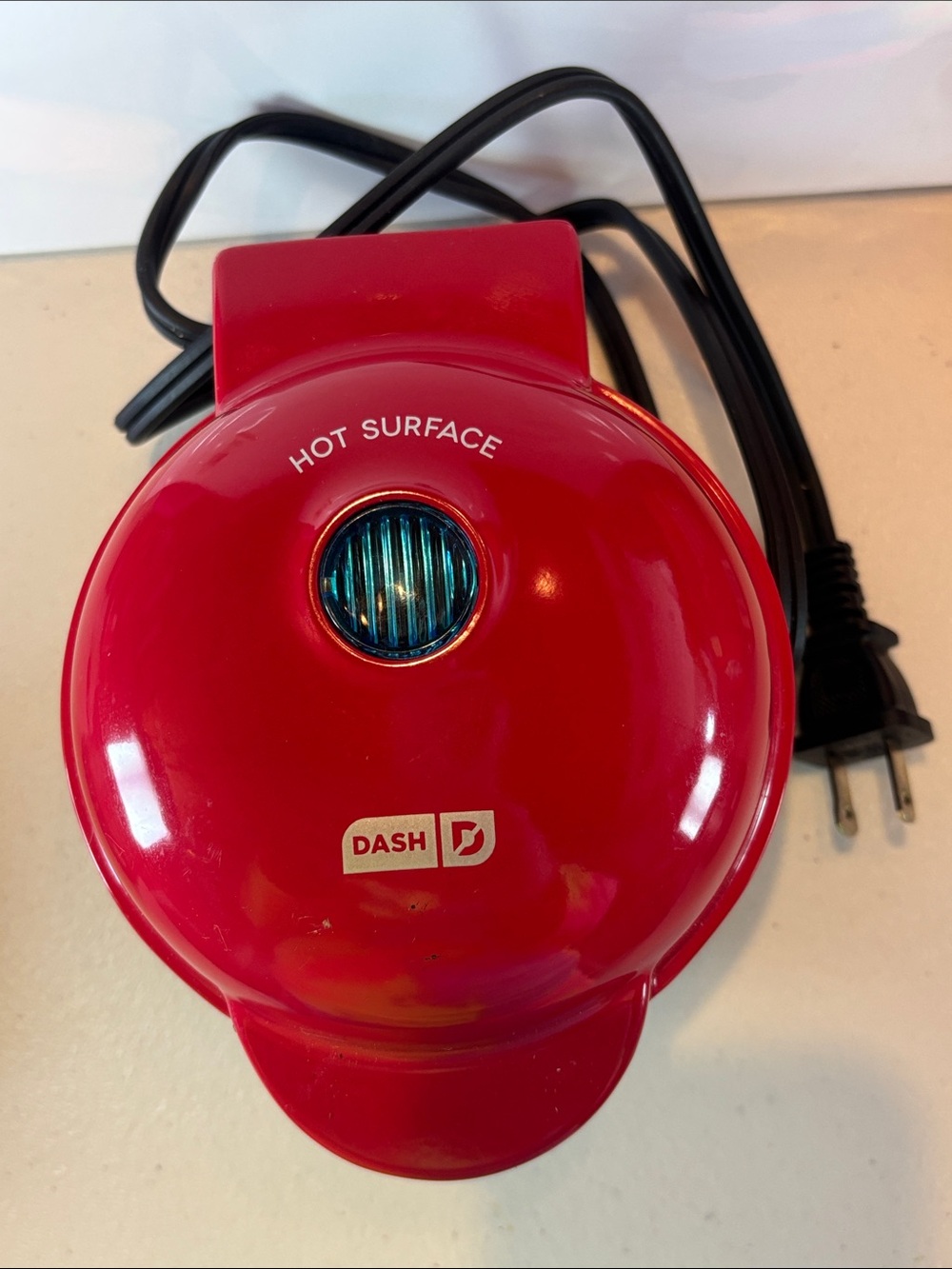 NWOT-Dash Mini Pie Maker in Red with a Blue Indicator Light on Top.